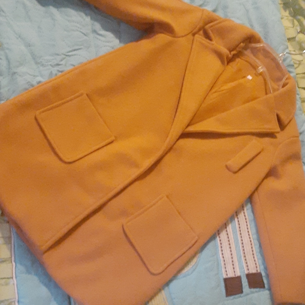 ONLY USED ONCE KIDS COAT!